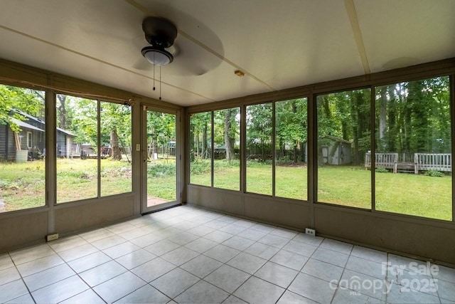 5233 Great Wagon Rd, Charlotte, NC 28215 - unfurnished sunroom featuring a ceiling fan and healthy amount of natural light