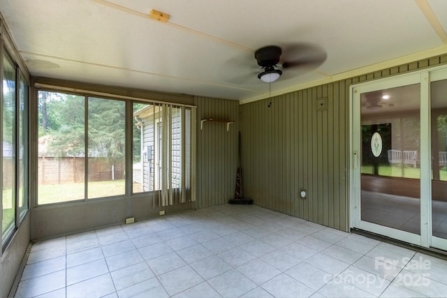 5233 Great Wagon Rd, Charlotte, NC 28215 - unfurnished sunroom featuring a ceiling fan and plenty of natural light