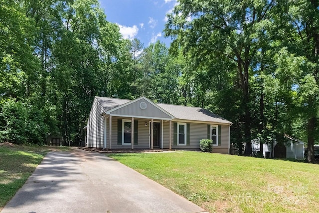 5233 Great Wagon Rd, Charlotte, NC 28215 - view of front of property featuring driveway, a porch, and a front yard