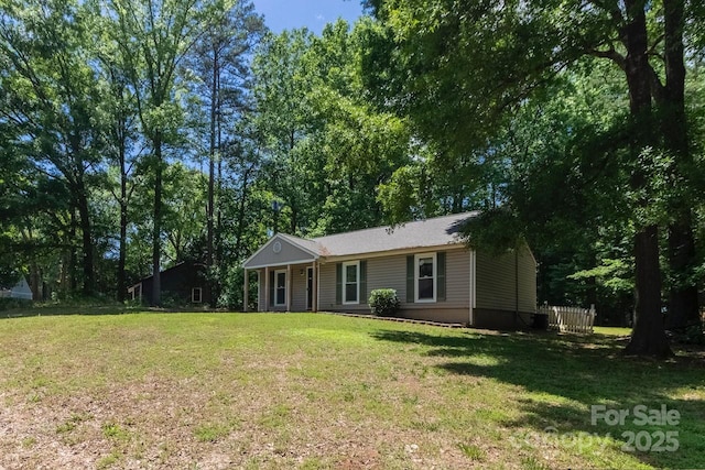 5233 Great Wagon Rd, Charlotte, NC 28215 - single story home featuring a front yard
