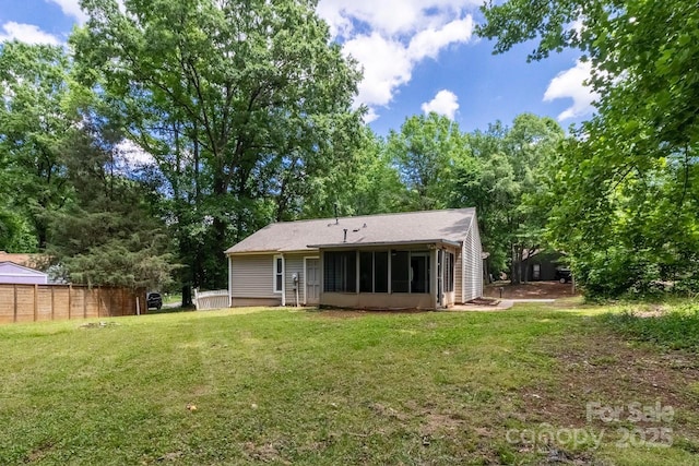 5233 Great Wagon Rd, Charlotte, NC 28215 - rear view of property featuring a sunroom
