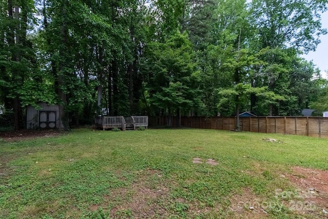 5233 Great Wagon Rd, Charlotte, NC 28215 - view of yard with a wooden deck