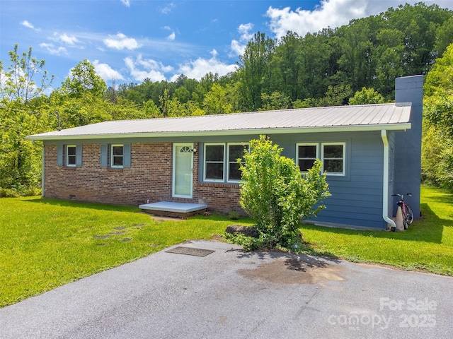 285 Painter Rd S, Cullowhee, NC 28723 - ranch-style house with a front lawn, metal roof, a chimney, and brick siding