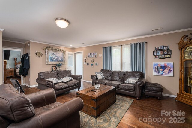 792 Carolina Mill Cir, Lincolnton, NC 28092 - living room with dark wood-style floors, crown molding, and baseboards