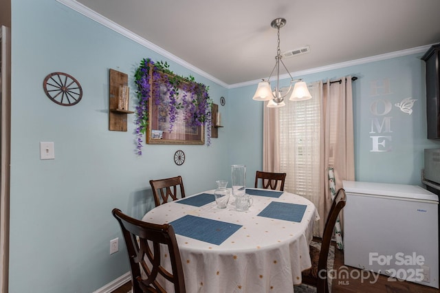 792 Carolina Mill Cir, Lincolnton, NC 28092 - dining area with a chandelier and crown molding