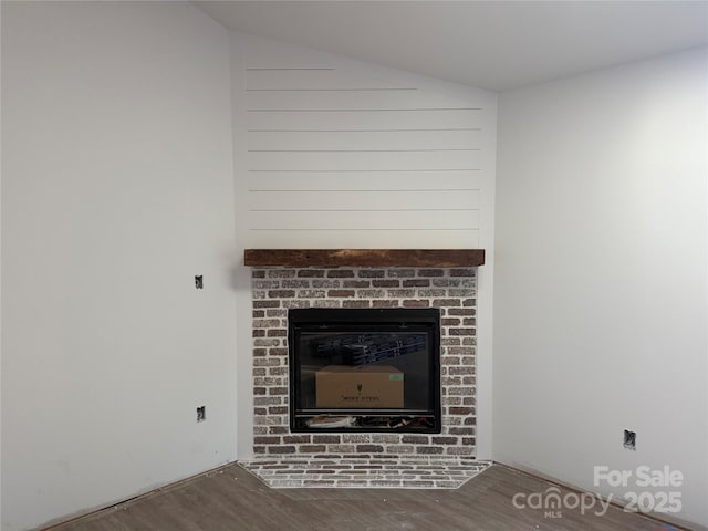 2027 Marquesas Ave, Tega Cay, SC 29708 - detailed view of wood finished floors and a fireplace