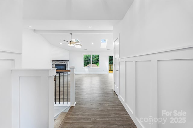 2027 Marquesas Ave, Tega Cay, SC 29708 - hallway featuring dark wood-style floors, beam ceiling, recessed lighting, and high vaulted ceiling