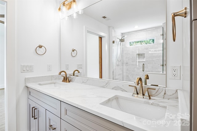 2027 Marquesas Ave, Tega Cay, SC 29708 - bathroom featuring double vanity and a stall shower