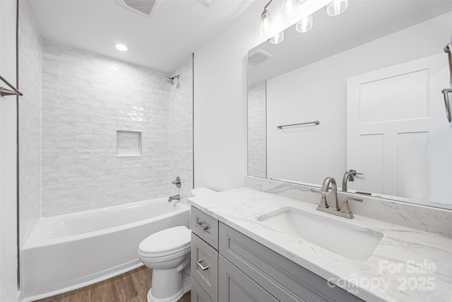 2027 Marquesas Ave, Tega Cay, SC 29708 - bathroom with wood finished floors, vanity, shower / bathtub combination, and recessed lighting