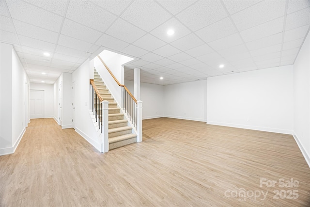 2027 Marquesas Ave, Tega Cay, SC 29708 - finished basement with stairs, light wood-style floors, and recessed lighting