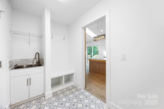 2027 Marquesas Ave, Tega Cay, SC 29708 - mudroom featuring a sink and baseboards