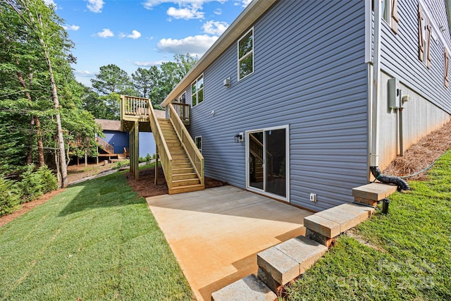 2027 Marquesas Ave, Tega Cay, SC 29708 - back of property with a yard, a patio area, stairs, and a deck