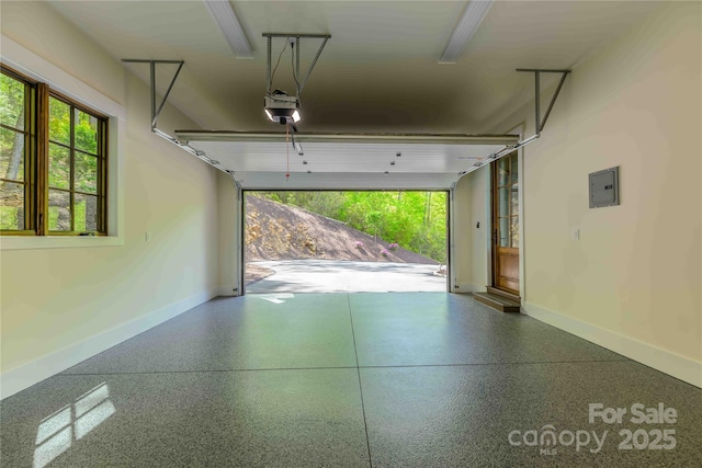615 Macallan Dr Unit 321, Waynesville, NC 28786 - garage with baseboards, a garage door opener, and electric panel