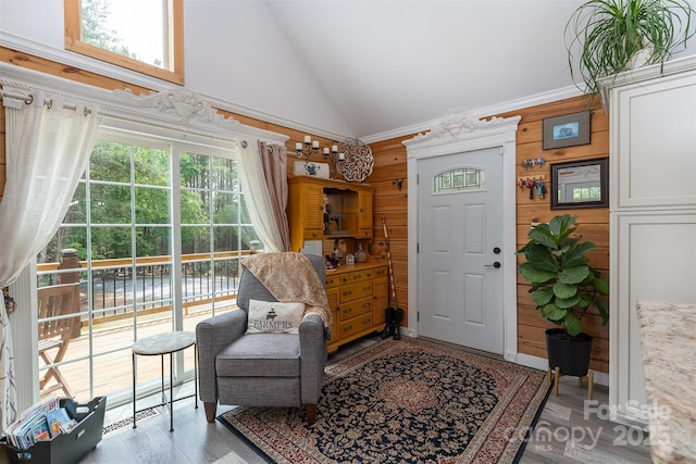 334 Arbra Mountain Way, Bostic, NC 28018 - entryway with healthy amount of natural light, high vaulted ceiling, wood walls, and light wood-style floors