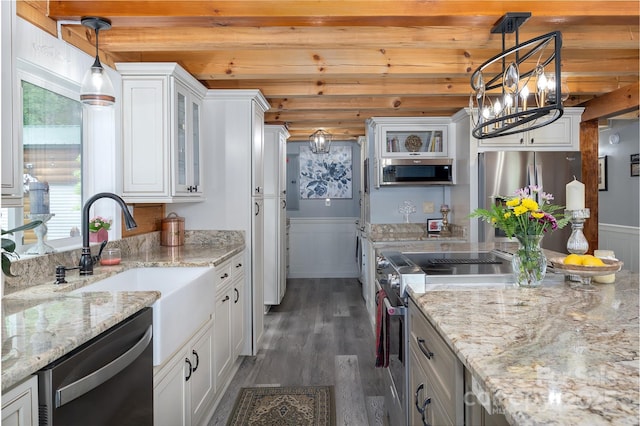 334 Arbra Mountain Way, Bostic, NC 28018 - kitchen featuring stainless steel appliances, white cabinets, dark wood finished floors, glass insert cabinets, and a chandelier