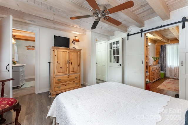 334 Arbra Mountain Way, Bostic, NC 28018 - bedroom with a barn door, wood finished floors, wooden ceiling with exposed beams, baseboards, and ceiling fan