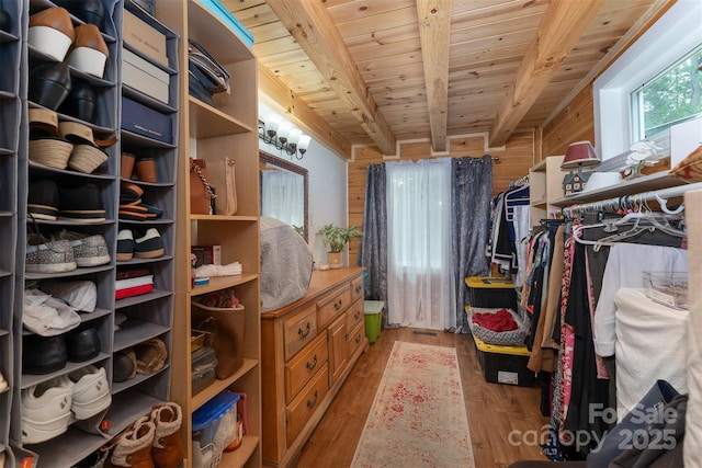 334 Arbra Mountain Way, Bostic, NC 28018 - spacious closet featuring beam ceiling and wood finished floors
