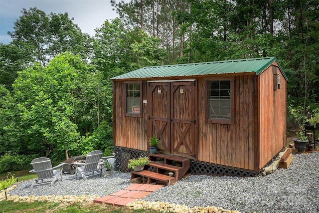 334 Arbra Mountain Way, Bostic, NC 28018 - view of shed featuring an outdoor fire pit