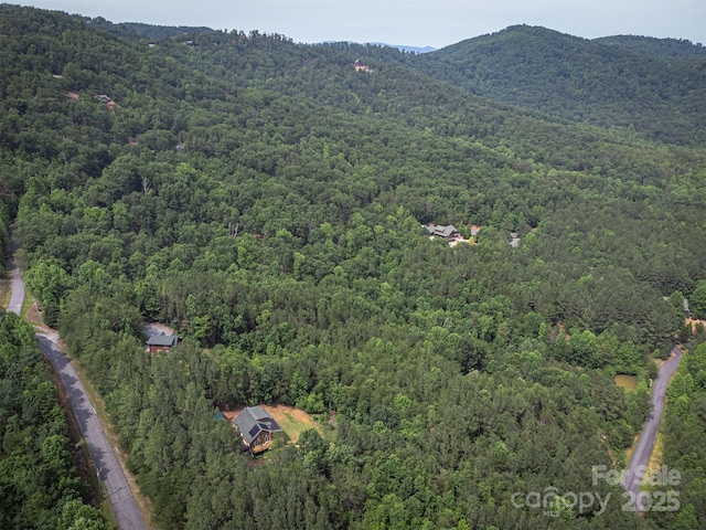 334 Arbra Mountain Way, Bostic, NC 28018 - aerial view of property and surrounding area with a heavily wooded area and mountains