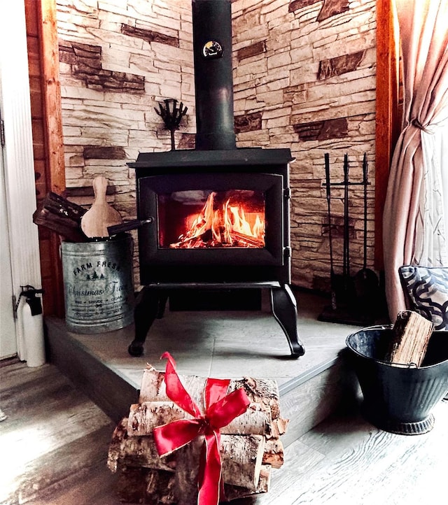 334 Arbra Mountain Way, Bostic, NC 28018 - detailed view of wood finished floors and a wood stove