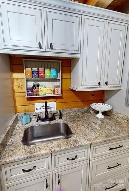 334 Arbra Mountain Way, Bostic, NC 28018 - kitchen featuring a sink, white cabinetry, light stone countertops, and open shelves