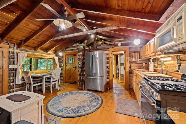 3739 Pickens Hwy, Rosman, NC 28772 - kitchen with stainless steel appliances, wood ceiling, light wood-type flooring, a sink, and a ceiling fan