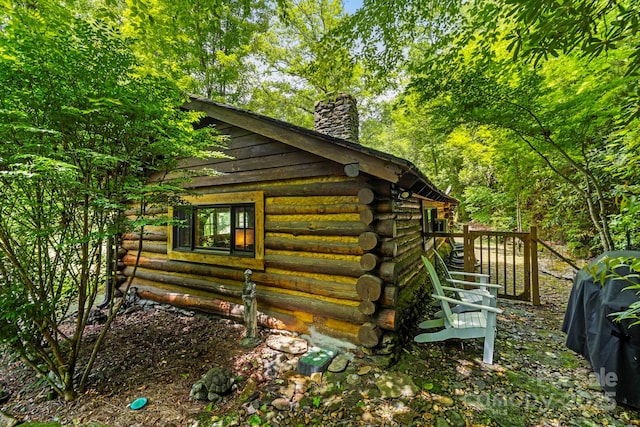 3739 Pickens Hwy, Rosman, NC 28772 - view of home's exterior with a chimney and log exterior