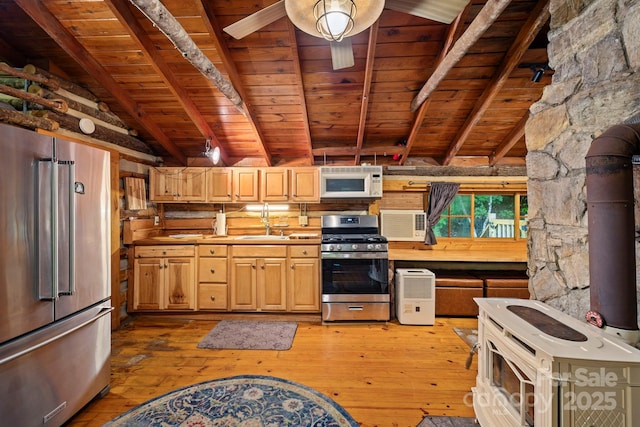 3739 Pickens Hwy, Rosman, NC 28772 - kitchen with stainless steel appliances, wooden ceiling, a sink, light wood-style flooring, and a ceiling fan