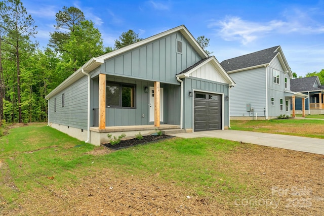101 Churchill Dr, Kings Mountain, NC 28086 - modern farmhouse style home featuring board and batten siding, a garage, driveway, a porch, and a front lawn