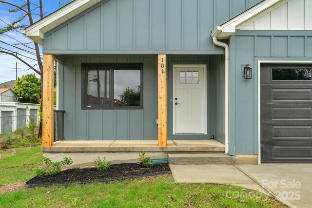 101 Churchill Dr, Kings Mountain, NC 28086 - view of exterior entry with board and batten siding and a porch