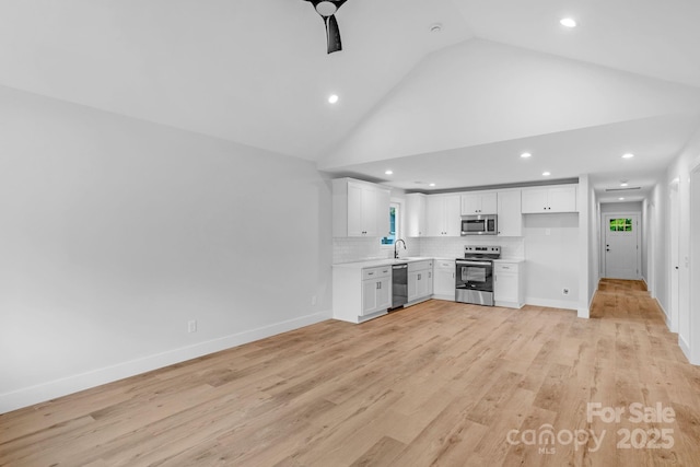 101 Churchill Dr, Kings Mountain, NC 28086 - kitchen featuring stainless steel appliances, recessed lighting, light countertops, white cabinets, and backsplash