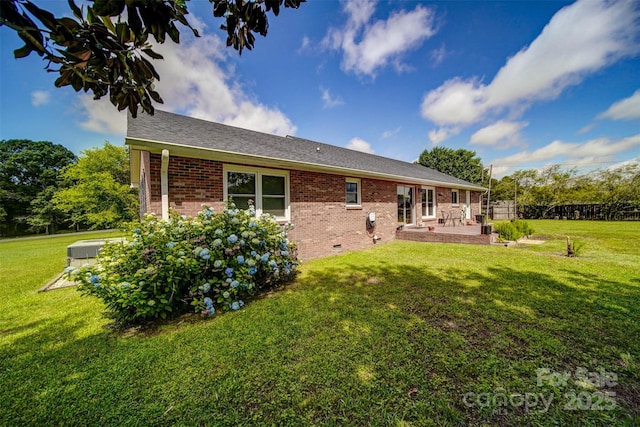 801 Witmore Rd, Wingate, NC 28174 - back of house featuring a patio area, brick siding, and a shingled roof