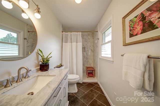 801 Witmore Rd, Wingate, NC 28174 - full bath with toilet, vanity, a shower with shower curtain, tile patterned flooring, and baseboards