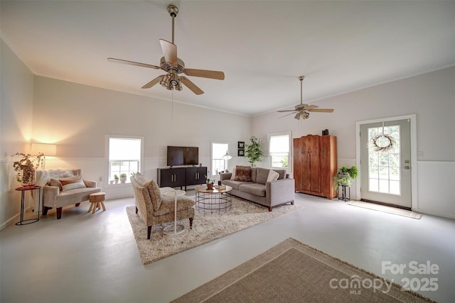 801 Witmore Rd, Wingate, NC 28174 - living area with ceiling fan, healthy amount of natural light, finished concrete floors, crown molding, and vaulted ceiling