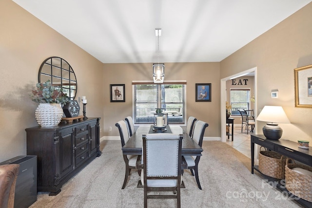 21 School House Rd, Pisgah Forest, NC 28768 - dining area featuring light carpet and baseboards