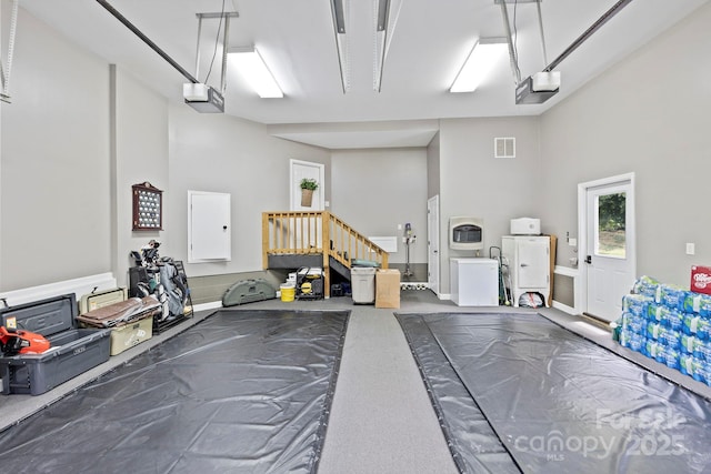 21 School House Rd, Pisgah Forest, NC 28768 - garage with a garage door opener
