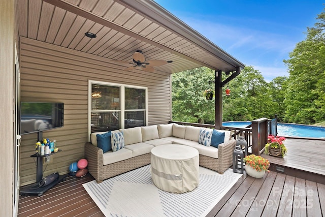 21 School House Rd, Pisgah Forest, NC 28768 - deck with an outdoor living space, an outdoor pool, and a ceiling fan