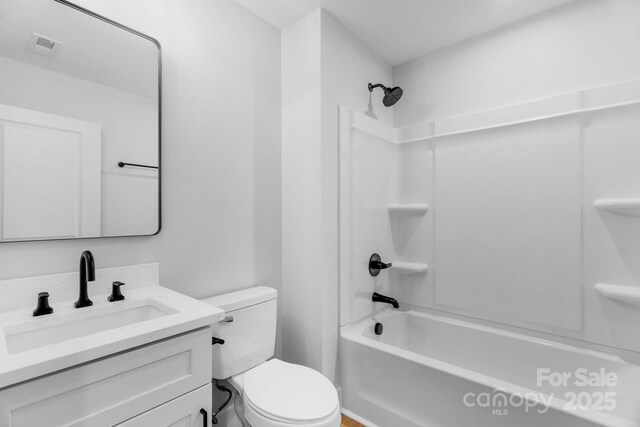 103 Churchill Dr, Kings Mountain, NC 28086 - bathroom featuring toilet, vanity, and bathtub / shower combination