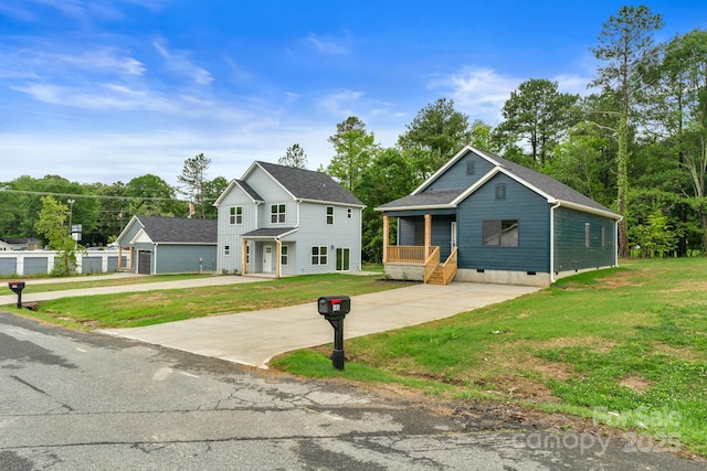 103 Churchill Dr, Kings Mountain, NC 28086 - view of front of house with concrete driveway, a front yard, and crawl space