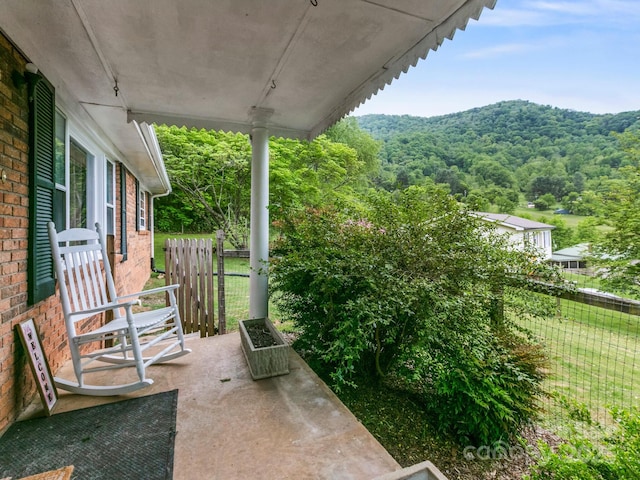 86 Hawk Haven Cv, Waynesville, NC 28786 - view of patio with a wooded view and a mountain view