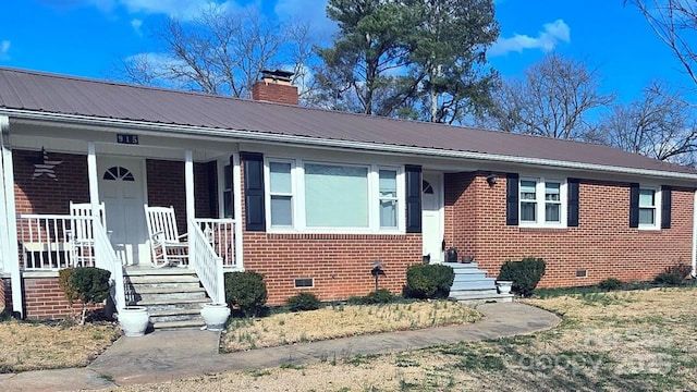 915 Wilkinsville Hwy, Gaffney, SC 29340 - bungalow-style house featuring brick siding, a porch, crawl space, a chimney, and metal roof