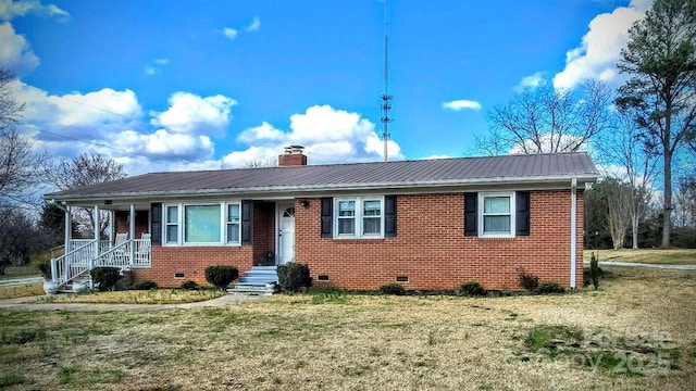 915 Wilkinsville Hwy, Gaffney, SC 29340 - view of front of property featuring metal roof, brick siding, crawl space, and a chimney