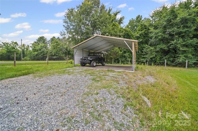 2291 Howell Rd, Midland, NC 28107 - view of parking with driveway and a carport