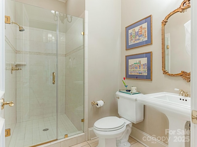 2516 Selwyn Ave, Charlotte, NC 28209 - full bath with toilet, tile patterned floors, a stall shower, and baseboards