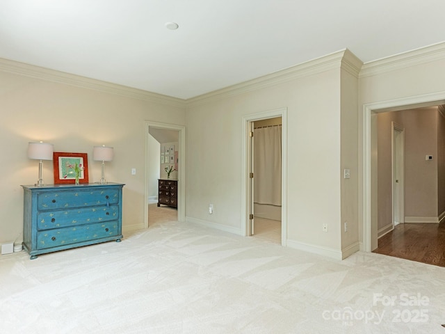 2516 Selwyn Ave, Charlotte, NC 28209 - unfurnished bedroom with ornamental molding, carpet, and baseboards