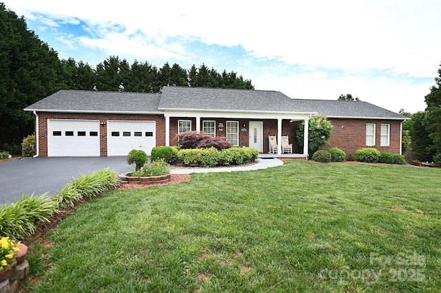 4646 River Run Cir, Hickory, NC 28602 - ranch-style house with brick siding, a garage, asphalt driveway, and a front yard