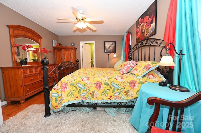 4646 River Run Cir, Hickory, NC 28602 - bedroom with wood finished floors and ceiling fan