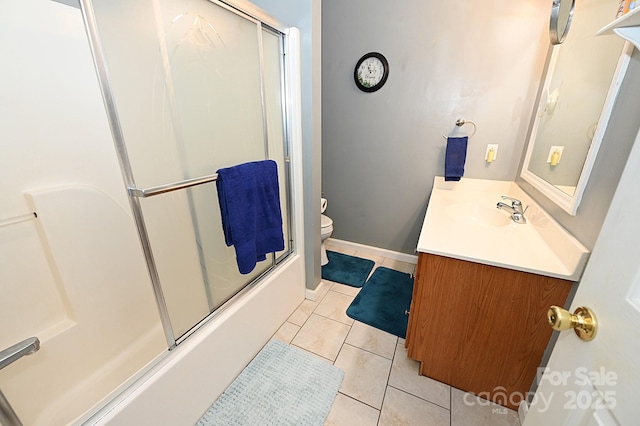 4646 River Run Cir, Hickory, NC 28602 - bathroom with tile patterned floors, vanity, toilet, and combined bath / shower with glass door