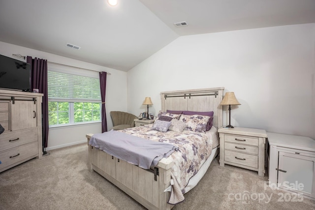 7527 Finnigan Rd, Charlotte, NC 28215 - bedroom featuring vaulted ceiling, light colored carpet, and baseboards