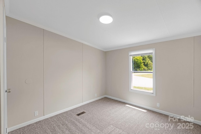 5606 S Rocky River Rd, Monroe, NC 28112 - carpeted empty room featuring baseboards and crown molding